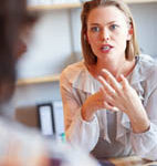 Woman talks to skin experts at central London's Elan Medical Skin Clinic about Roaccutane