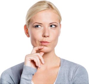 A young woman deep in thought - Essex skin expert Sue Ibrahim debunks skin care advice for using moisturisers and detoxing.